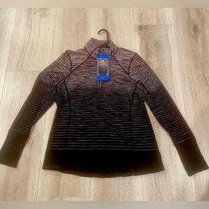 Ladies quarter zip jacket. Size large Kirkland brand. NWT super warm and cozy.
